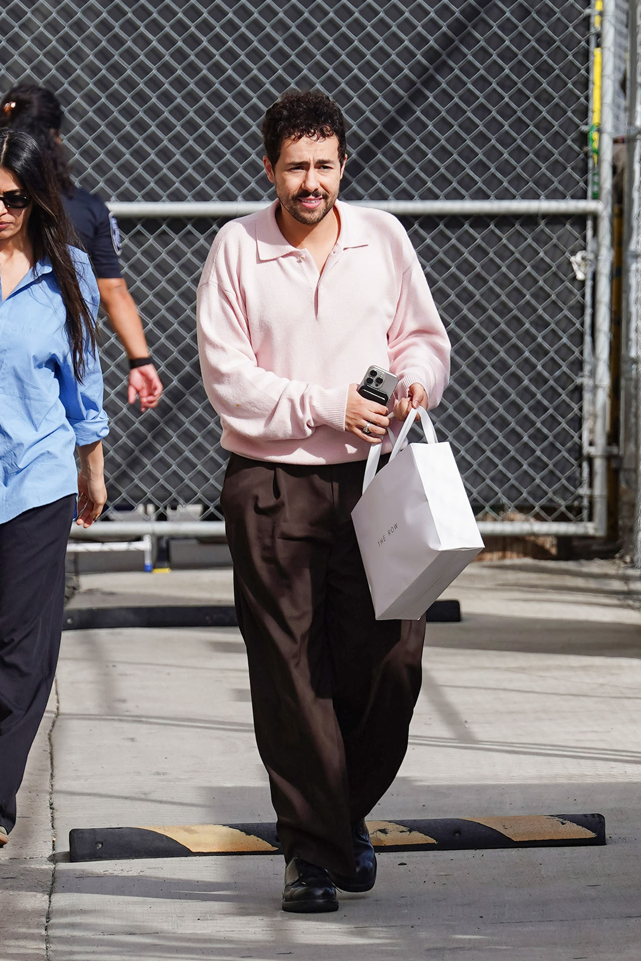 <p><em>Ramy Youssef</em></p><p>&nbsp;</p><p>In a more recent appearance, Ramy Youssef&mdash;fresh off an excellent appearance in&nbsp;<em>Poor Things&mdash;</em>stopped by Jimmy Kimmel in a baby pink pastel knit polo from celebrity favourite <a href="https://www.mytheresa.com/au/en/men/the-row-joyce-cotton-and-cashmere-polo-sweater-pink-p00895186?" target="_blank" rel="nofollow noopener">The Row</a>. This cotton and cashmere blend keeps things light for those warmer autumn days while still retaining the soft luxury and flowy structure of cashmere.&nbsp;</p>