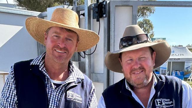 Bob Thornely and Simon Flinn of Flinn Designs at The Rock in southern NSW win the Henty Machinery Field Days Machine of the Year award with their ergonomically designed automated catching pen.  Picture: Nikki Reynolds