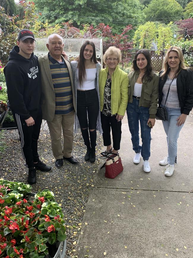 Fotios Karamitos (second L) who died after contracting COVID-19. This picture shows Fotios at family lunch at Warrandyte Nursery. (L-R) Foti Karamitos (Grandson), Fotios Karamitos, Vas Karamitos (Granddaughter), Sophia Karamitos (wife), Sophia Karamitos (Granddaughter), Kate Karamitos (daughter-in-law)