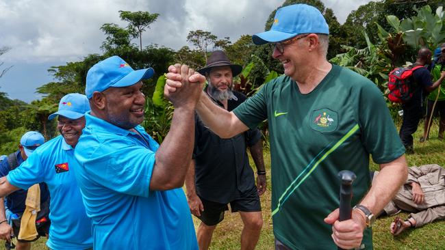 PAPUA NEW GUINEA: Newswire Photos: APRIL 24 2024: Australia's Prime Minister Anthony Albanese and Papua New Guinea Prime Minister James Marape walk along the Kokoda Track at Kokoda Village in Papua New Guinea on April 24, 2024. Prime Minister Anthony Albanese slips over. Picture: NCA NewsWire via the Australian Prime Ministers Office