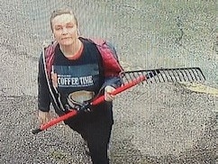 Mary-Ann Martinek was allegedly caught on camera attacking her neighbour's security camera with a garden rake. Picture: Supplied.