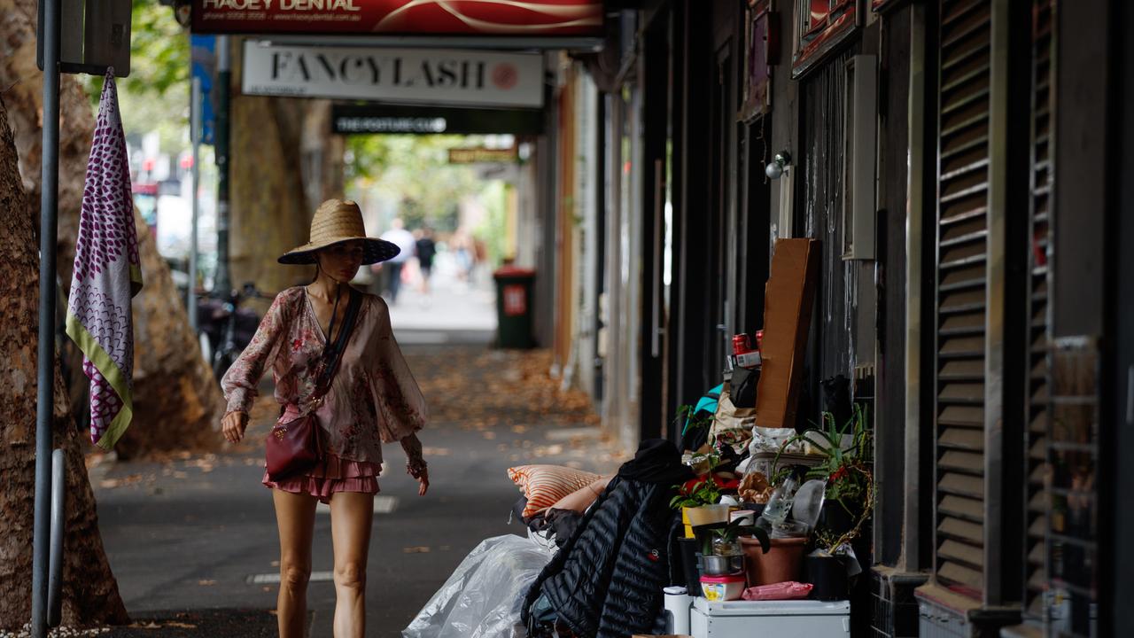 A woman walks past a makeshift home set up in Kings Cross. Picture: NCA NewsWire / Nikki Short