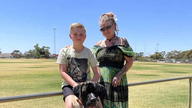 Gypsy Peace and Buddy Snewin, with dog Humphry, are thankful for the support at the Mannum emergency relief centre. Photo: Dylan Hogarth