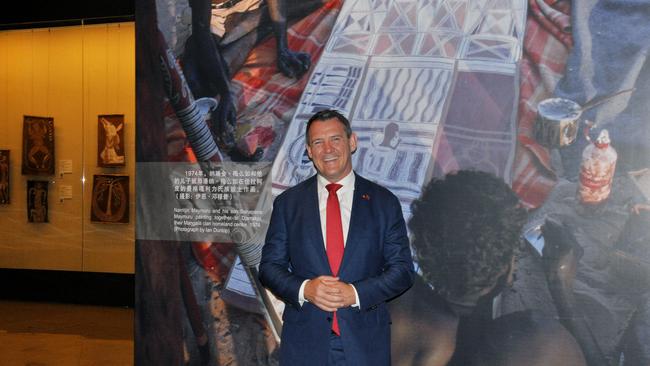 NT Chief Minister Michael Gunner poses in front of a photo from the 'Old Masters' exhibition at the National Museum of China, in Shenzhen. Picture: Lauren Roberts