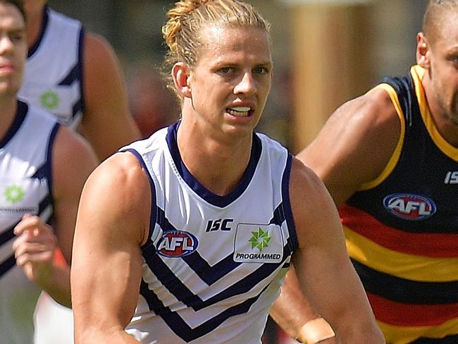 ADELAIDE, AUSTRALIA - FEBRUARY 25: Nat Fyfe of the Dockers looks upfield during the JLT Community Series AFL match between the Adelaide Crows and the Fremantle Dockers at Strathalbyn Oval on February 25, 2018 in Adelaide, Australia.  (Photo by Daniel Kalisz/Getty Images)