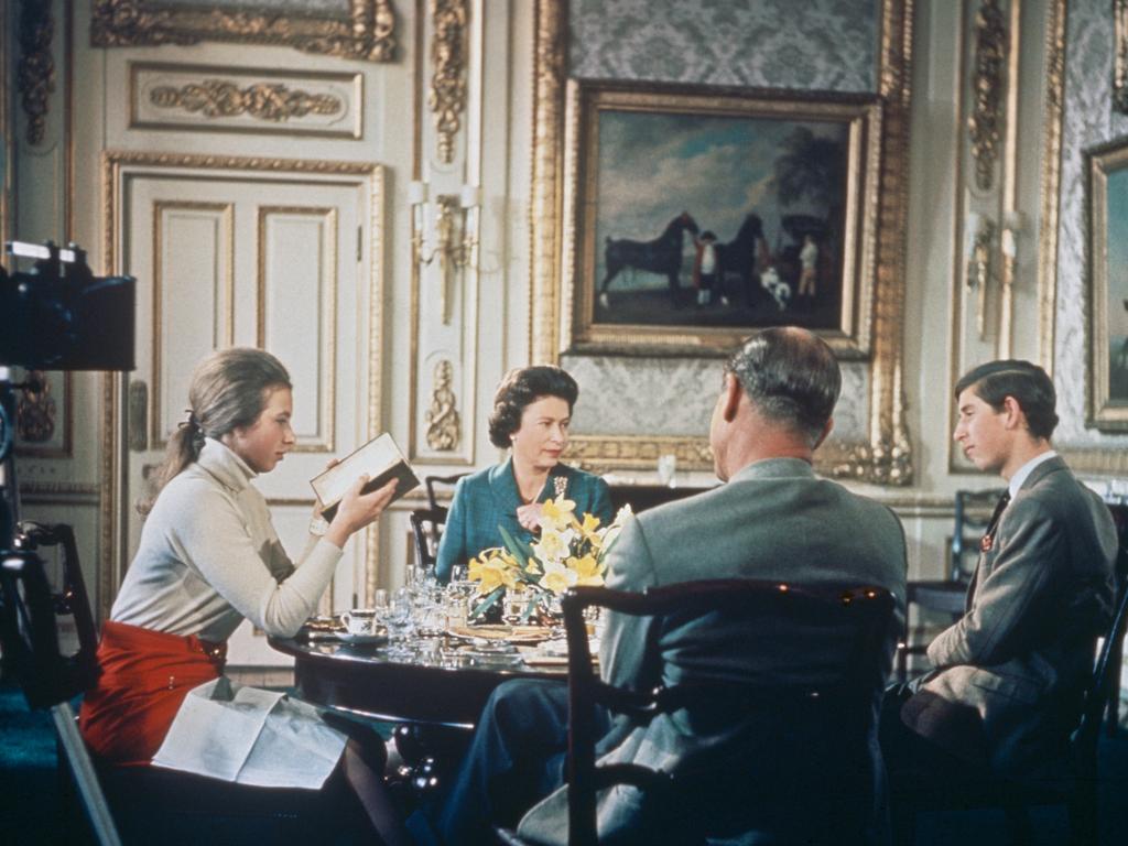 1969: Queen Elizabeth II lunches with Prince Philip and their children Princess Anne and Prince Charles at Windsor Castle. A camera (left) is set up to film for Richard Cawston’s BBC documentary ‘Royal Family’. Picture: Hulton Archive/Getty Images