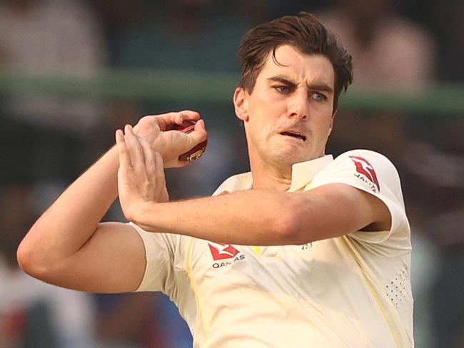 DELHI, INDIA - FEBRUARY 17: Pat Cummins of Australia bowls during day one of the Second Test match in the series between India and Australia at Arun Jaitley Stadium on February 17, 2023 in Delhi, India. (Photo by Robert Cianflone/Getty Images)
