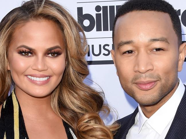 LAS VEGAS, NV - MAY 17: Host Chrissy Teigen (L) and musician John Legend attend the 2015 Billboard Music Awards at MGM Grand Garden Arena on May 17, 2015 in Las Vegas, Nevada. (Photo by Jason Merritt/Getty Images)