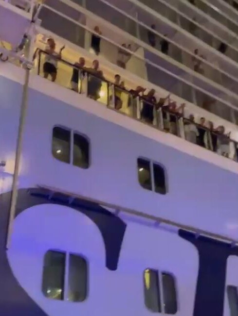 Passengers watched on as Matt Gilbertson aka Hans was taken from the cruise ship after the stage fall. Picture: Facebook