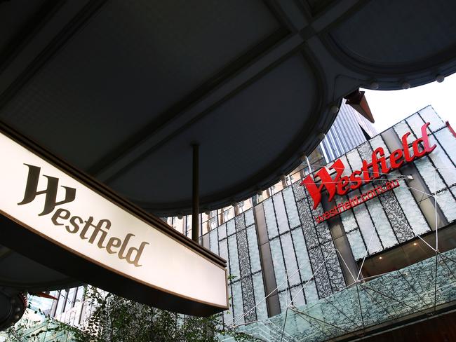 The Westfield Group logo is displayed outside the company's Westfield Sydney shopping mall in Sydney, Australia, on Thursday, May 29, 2014. Frank Lowy, the billionaire founder of Westfield Group, said Australia's biggest shopping mall operator will press ahead with separating its global and local businesses even as a shareholder vote on the plan appears too close to call. Photographer: Brendon Thorne/Bloomberg