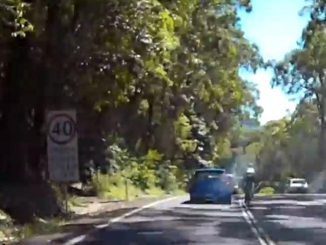 Cyclist Filmed Overtaking Cars Crossing Median Strip Down Bulli Pass Daily Telegraph 