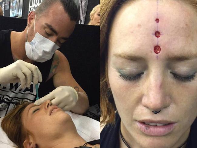 Brendan Russell performing a scarification procedure on a woman at a New Zealand tattoo expo. Picture: Facebook