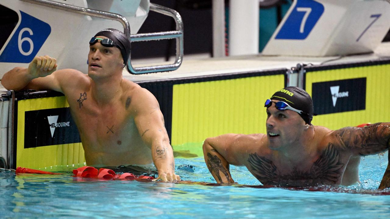 Cody Simpson (L) and Kyle Chalmers of Australia look at their times after the men's 100m butterfly swimming final during the 2023 Australian World Championship Trials in Melbourne on June 18, 2023. (Photo by William WEST / AFP) / —IMAGE RESTRICTED TO EDITORIAL USE – STRICTLY NO COMMERCIAL USE —