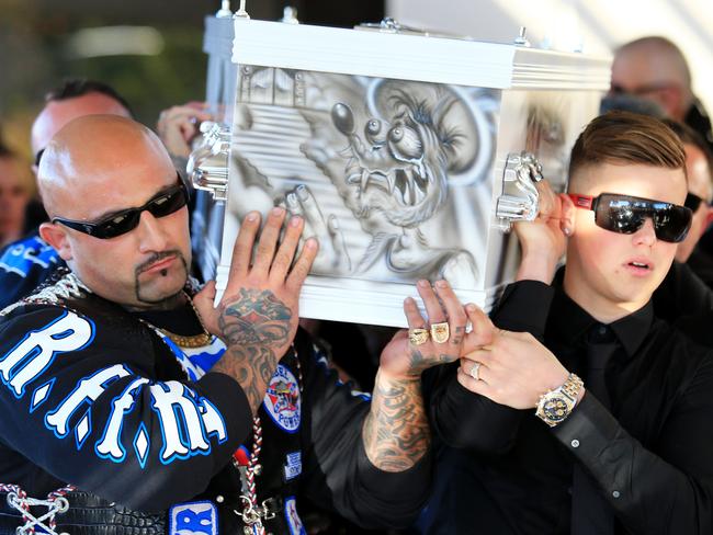 Simon's son (right) carries the casket of the church. Picture: Adam Taylor