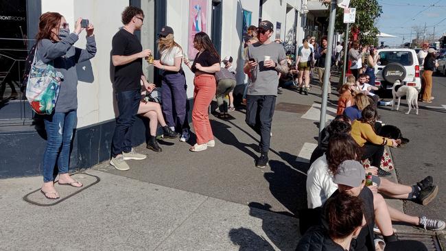 People gather to dance and drink in the sun. Picture: Andrew Henshaw