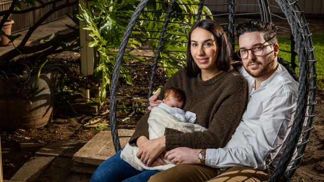 Lauren and Christopher Fitridge with baby Grace have recently bought a home and are now gearing up for a hike in mortgage repayments. Picture: Tom Huntley