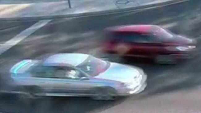 A still of CCTV footage of a silver car that cops believe may have been involved in a hit and run which left a 5-year-old boy injured. Picture: NT Police