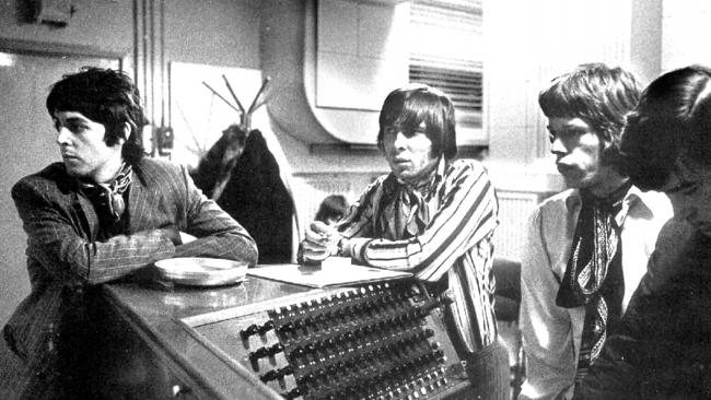 Paul McCartney, left, with Rolling Stones producer Glyn Johns and frontman Mick Jagger.