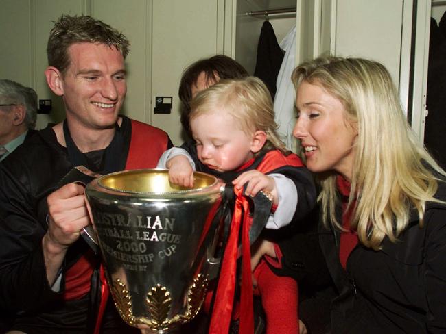 James and Tania Hird with young daughter Stephanie, who had taken ill before the 2000 preliminary final.