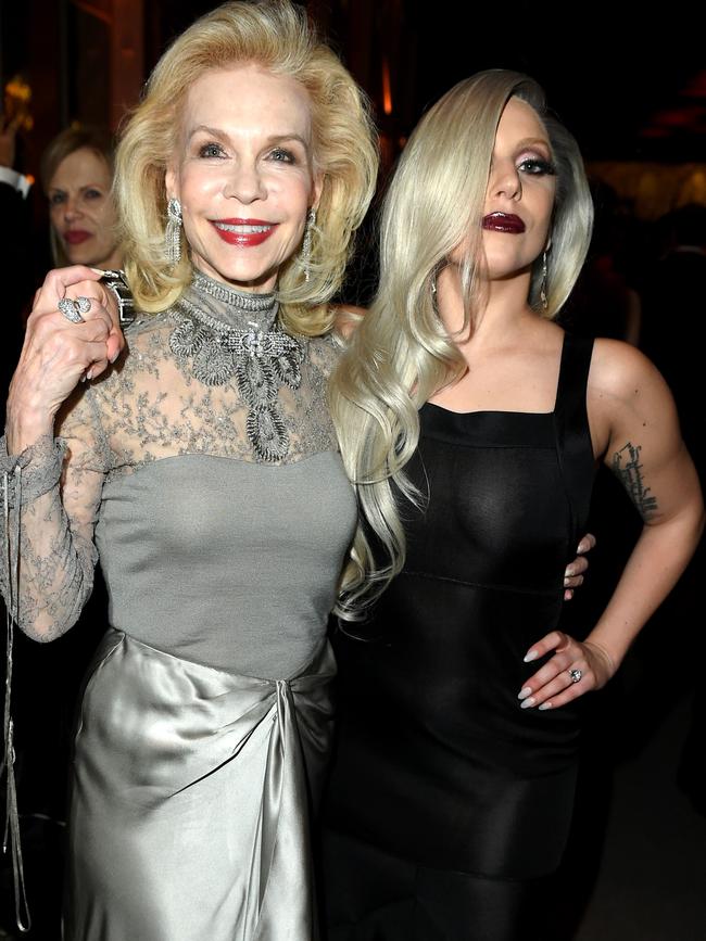 Philanthropist Lynn Wyatt (L) and recording artist Lady Gaga attend the 2015 Vanity Fair Oscar Party after Gaga’s impressive performance at the awards. Picture: Getty