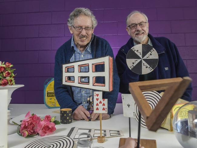 Curiosity Show hosts.South Australia's long-running Curiosity Show hosts Dr Rob Morrison (R)  and Dr Deane Hutton (L) demonstrating illusions from their back catalogueThursday 19 August 2021 Pic Roy VanDerVegt