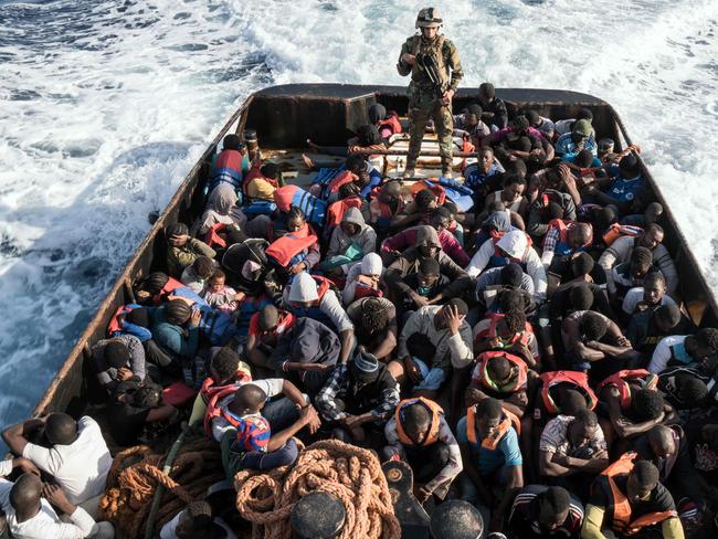 A Libyan coast guardsman stands on a boat during the rescue of 147 illegal immigrants attempting to reach Europe off the coastal town of Zawiyah last month. Picture: AFP