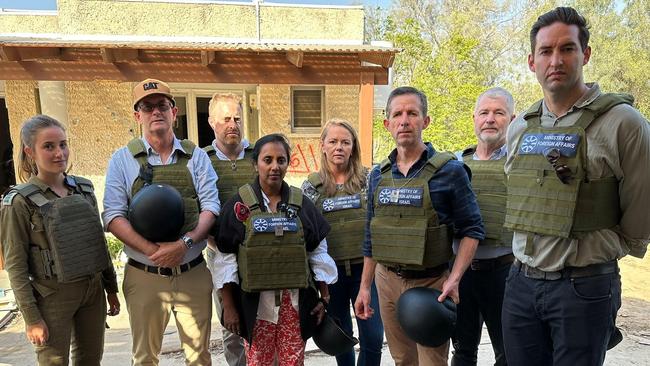 Australian MPs during a bipartisan trip to Israel, pictured with an IDF soldier, left.