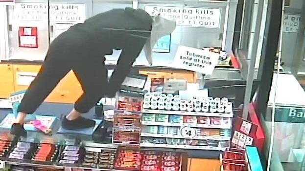 CCTV image of men who broke into the Caltex Service Station at Forresters Beach.
