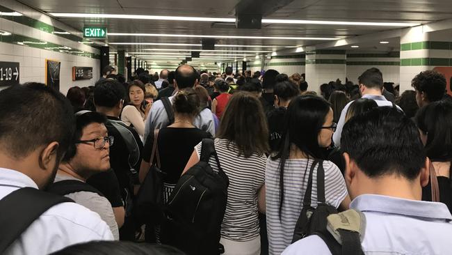 Commuters pour into platforms 18 and 19 at Central.