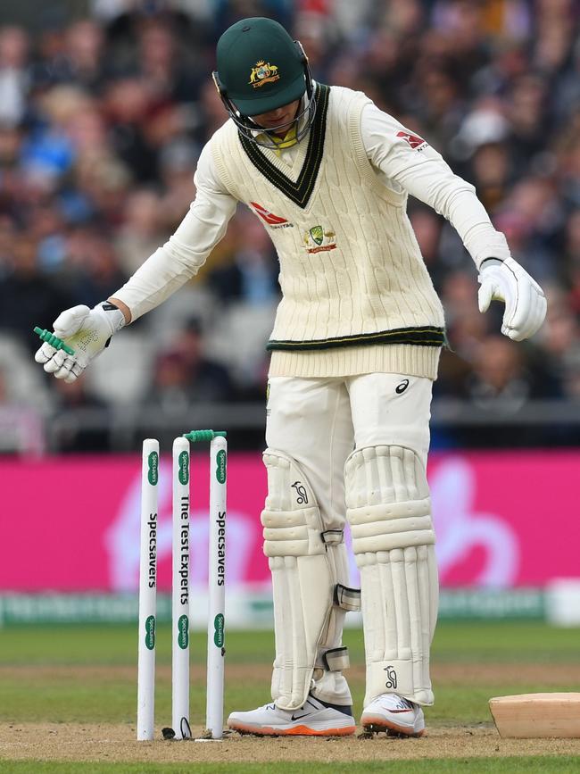 Australian batsman Marnus Labuschagne grabs a fallen bail at Old Trafford. Picture: AFP