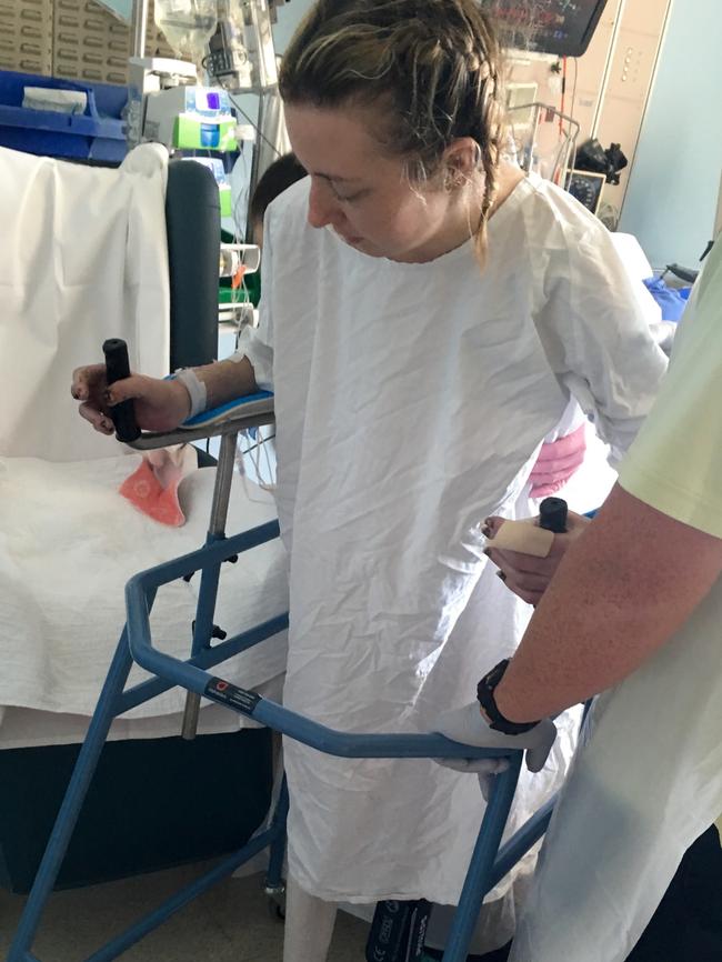 Sarah Joyce taking her first steps after being struck down by meningococcal disease.