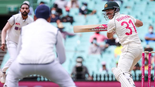 David Warner is caught off the bowling of Mohammed Siraj.