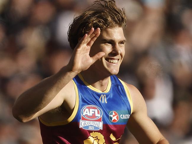 MELBOURNE, AUSTRALIA - SEPTEMBER 30: Deven Robertson of the Lions celebrates kicking a goal during the 2023 AFL Grand Final match between Collingwood Magpies and Brisbane Lions at Melbourne Cricket Ground, on September 30, 2023, in Melbourne, Australia. (Photo by Daniel Pockett/AFL Photos/via Getty Images)