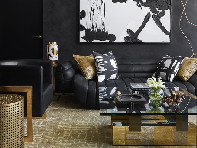 This Erskineville apartment was designed by Greg Natale for Anthony Semann and Troy Bettesworth, who wanted a dark, sophisticated apartment with a ‘70s club feel to it. Picture: Anson Smart