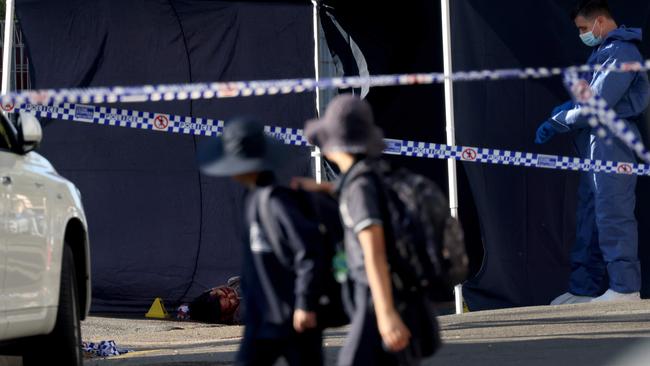 Two primary school students walk past the dead body of Ferenc Stemler in Canterbury in July 2023. Picture: NCA NewsWire