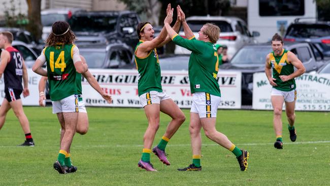 Leongatha's Jack Ginnane, right, celebrates one of his 11 goals with teammate Travis Nash. Picture: Mark Drury