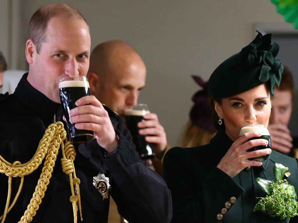 Celebrating St Patrick’s Day together with a pint of Guinness. Picture: AFP