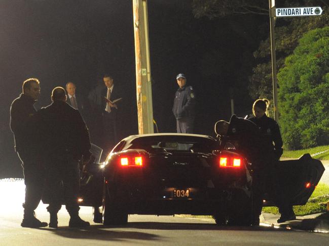 Police at scene where Fadi Ibrahim was shot five times and his 23-year-old girlfriend shot once in leg in his parked Lamborghini outside his Castle Cove home in 2009.