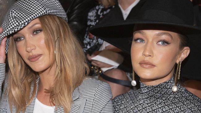 Fashion models Gigi Hadid, left, and Bella Hadid, right, attend the Tommy Hilfiger runway show during NYFW Spring/Summer 2020 at the Apollo Theater on Sunday, Sept. 8, 2019, in New York. (Photo by Andy Kropa/Invision/AP)