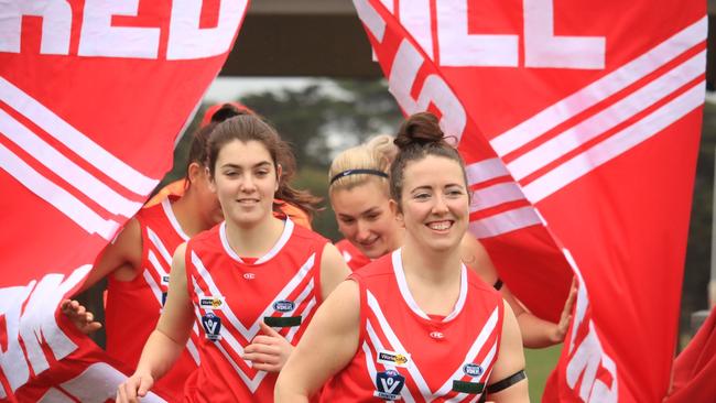 Red Hill players run onto the field last season. Picture: Liz Harris