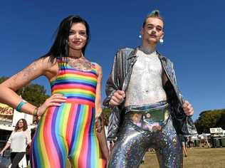 Courtney Smoulden and Dylan Barker sporting some of the extensive glitter available at Splendour in the Grass 2017 near Byron Bay. Picture: Marc Stapelberg