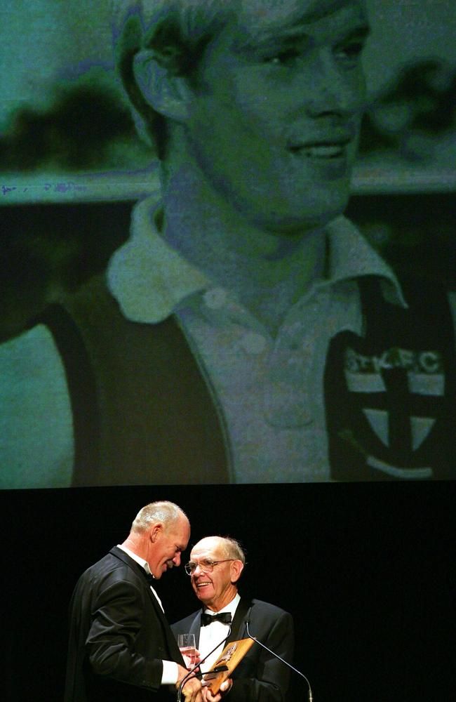 Carl Ditterich (left) is inducted into the AFL Hall of Fame by Allan Jeans in 2004. Picture: Getty