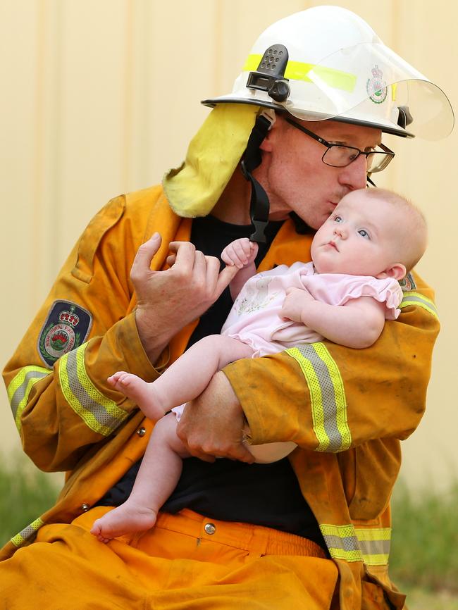 Ryan Channells with his three-month- old daughter Skye.