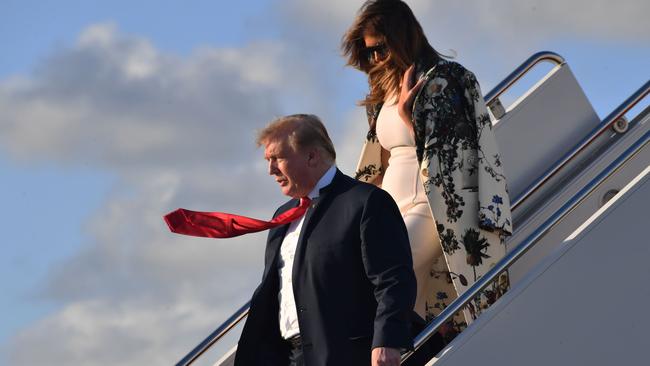 US President Donald Trump and First Lady Melania Trump step off Air Force One. Picture: Nicholas Kamm/AFP