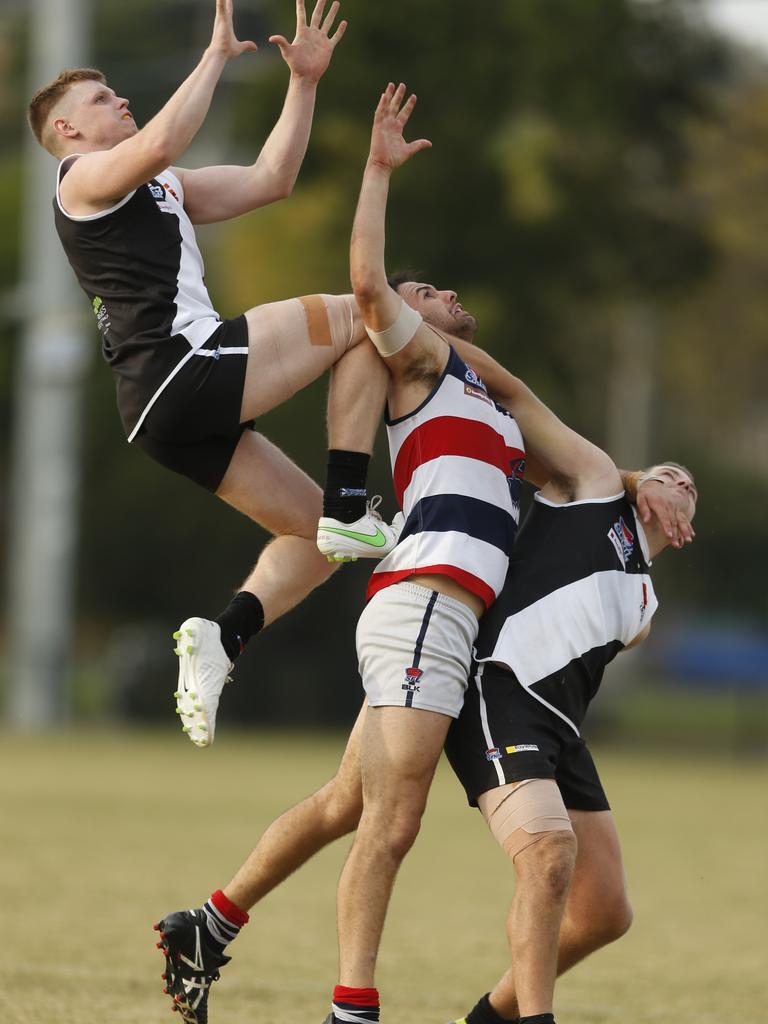 Southern: Oakleigh District’s Nathan Peddle leaps over the pack. Picture: Valeriu Campan