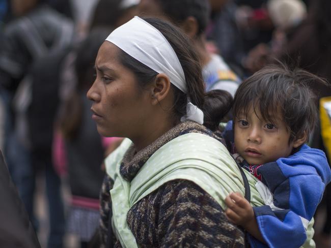 Members of a caravan of Central Americans have spent weeks travelling across Mexico to reach the US border. Picture: David McNew/Getty Images