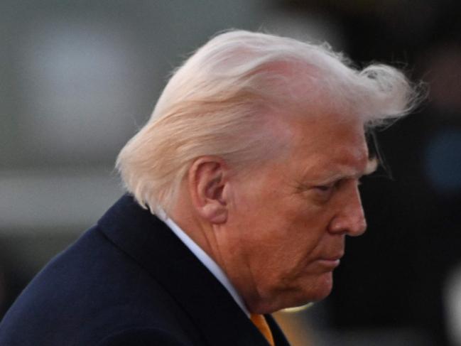 US President Donald Trump walks to board Air Force One at Joint Base Andrews in Maryland on March 7, 2025. Trump is traveling to his Mar-a-Lago resort in Florida. (Photo by ROBERTO SCHMIDT / AFP)