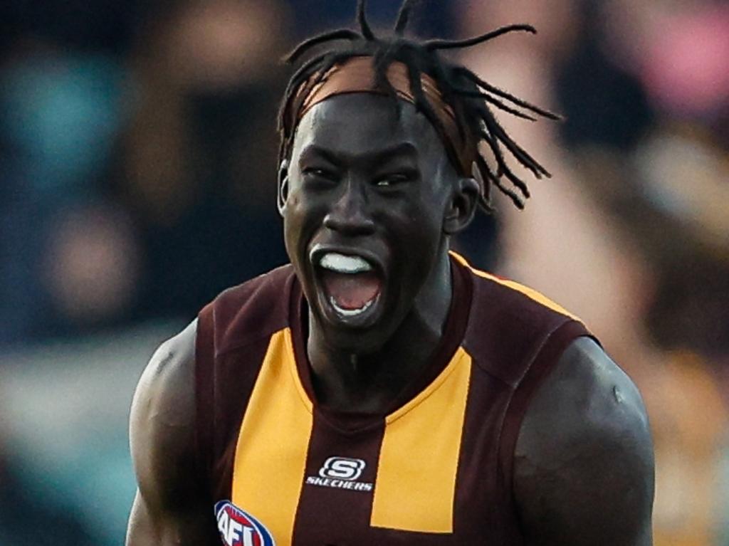 MELBOURNE, AUSTRALIA – JUNE 08: Changkuoth Jiath of the Hawks reacts after the final siren during the 2024 AFL Round 13 match between the Hawthorn Hawks and the GWS GIANTS at UTAS Stadium on June 08, 2024 in Launceston, Australia. (Photo by Dylan Burns/AFL Photos via Getty Images)