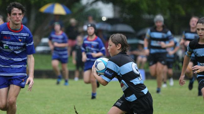 Day 1 of the King of the Country junior rugby union tournament at the Gold Coast Eagles Rugby Union Club.Maroochydore Swans (BLUE AND BLACK) vs USQ Saints (Blue ) Maroochydore Player No USQ Player No Pic Mike Batterham