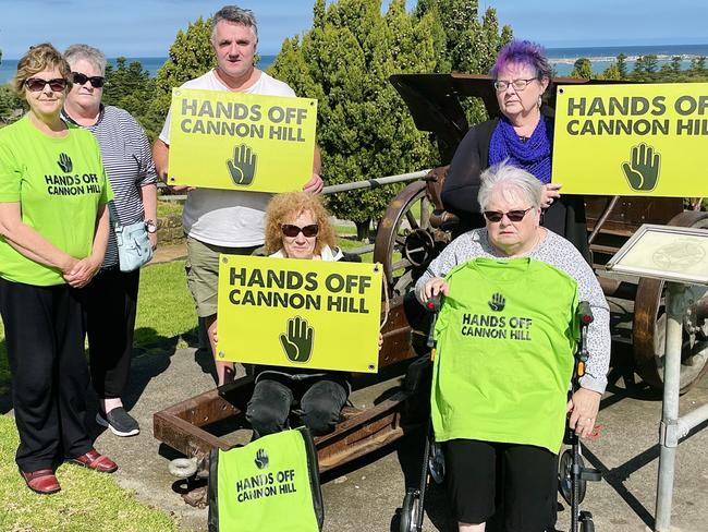 Warrnambool community members display the "Hands off Cannon Hill" merchandise. Picture: Jack Colantuono